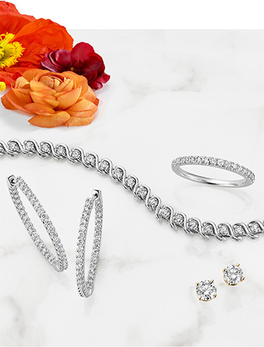Diamond ring, bracelet and earrings.